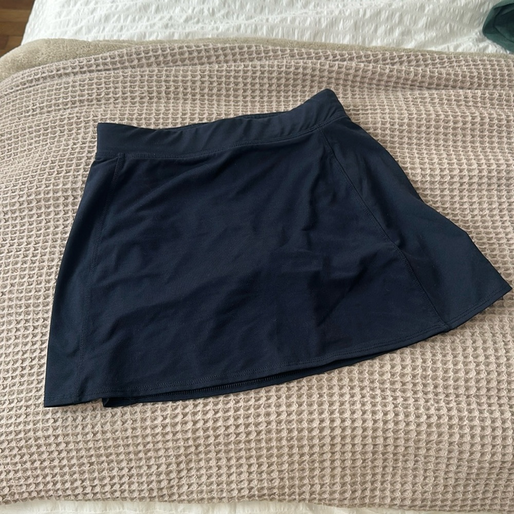 Aritzia TNAction triumph mini skirt in navy sz XXS